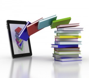  Stack of books getting downloaded onto a tablet.
